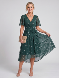 Mirabel | Kleid mit schwingenden Ärmeln und geraffter Taille im Blumenmuster