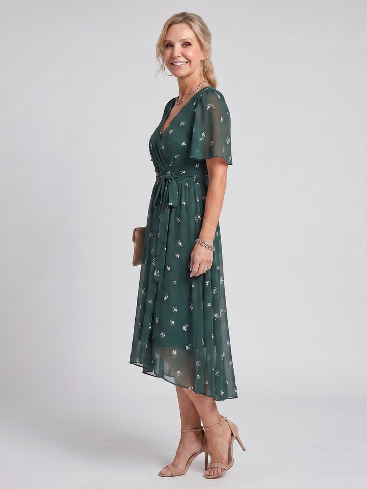 Mirabel | Kleid mit schwingenden Ärmeln und geraffter Taille im Blumenmuster